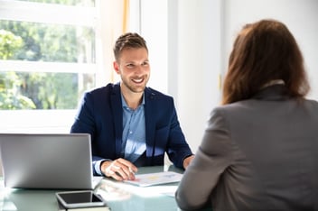Man Interviewing Woman Candidate