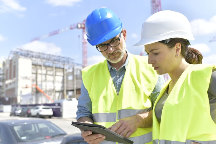 two construction workers on site