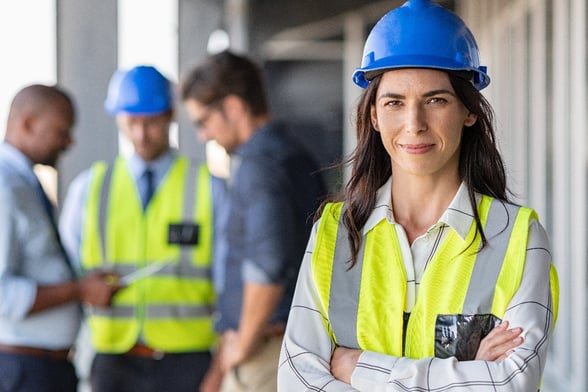 woman construction worker smiling at camera